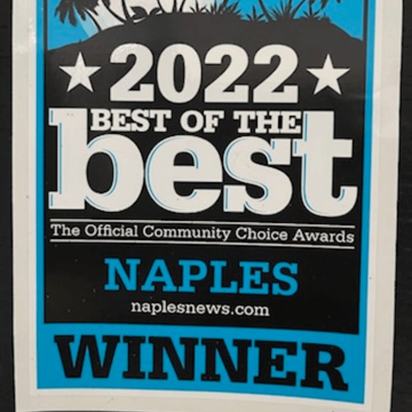 A "Best of the Best 2022 Naples Winner" award from naplesnews.com, featuring palm trees.